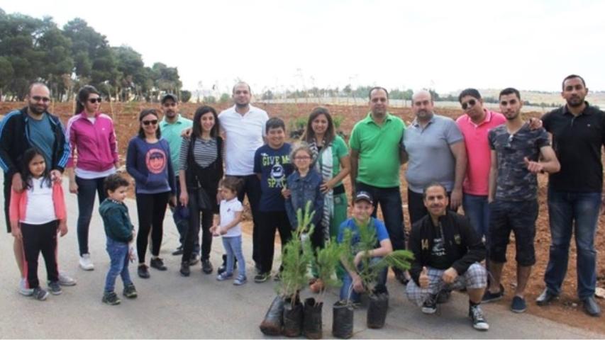 العربية ومجموعة أبو خضر للسيارات يزرعان الأشجار بعيد الإستقلال في غمدان - الأردن